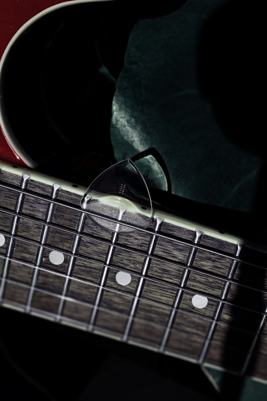 Close-up of a guitar neck and frets