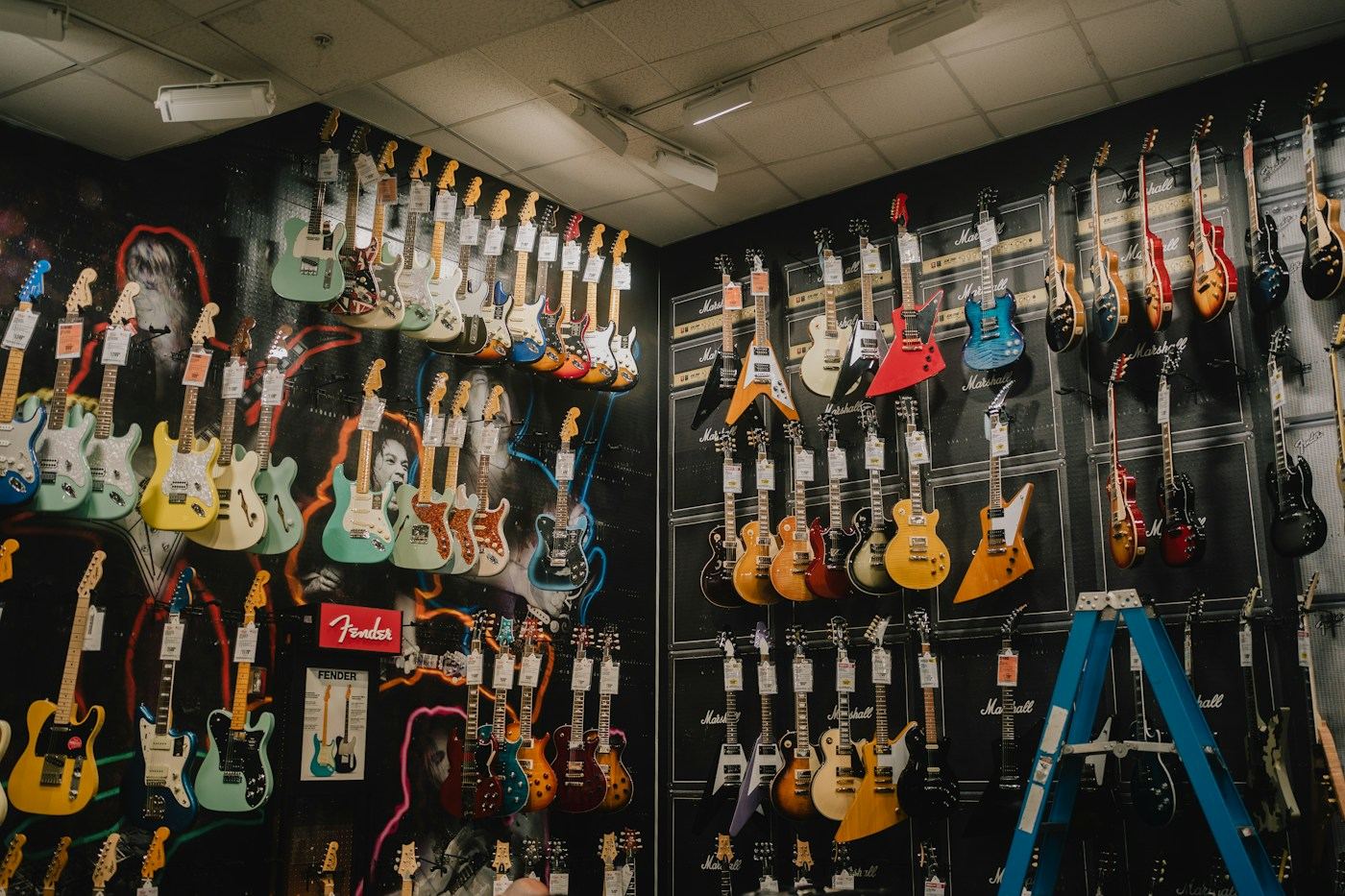 Guitars hanging in the shop
