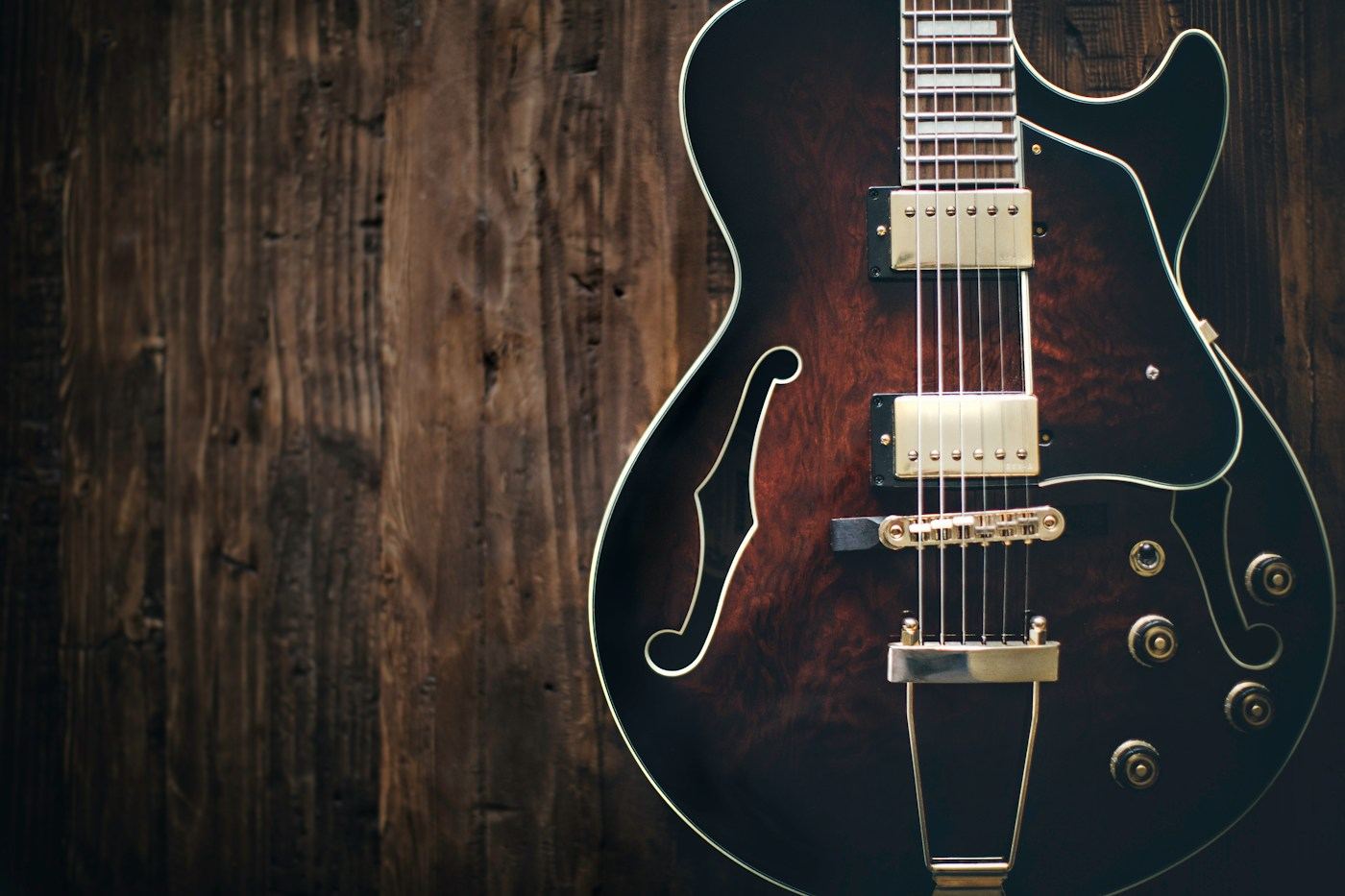 A hollow-body electric guitar